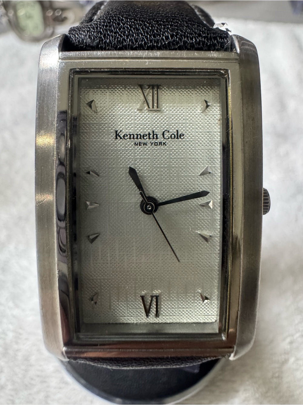 Kenneth Cole Silver Rectangular Case Watch with Black Leather Strap